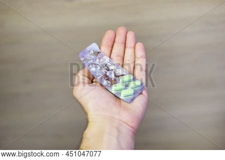 A Helping Hand Always Holds Out Pills To Patient