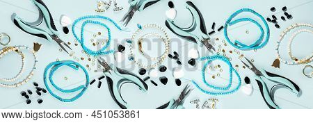 Tools And Accessories For Diy Jewelry In The Workplace. Flat Lay On Blue Cyan Background. Creative F