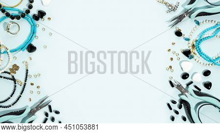 Tools And Accessories For Diy Jewelry In The Workplace. Flat Lay On A Blue Cyan Background. Creative
