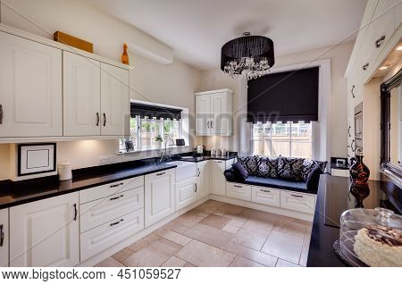 Modern Fitted Kitchen With Built In Cupboards And Appliances In Renovated Former Victorian Rectory W
