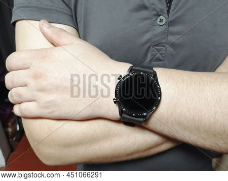 Smart Watch On The Hand Of A Man. Huawei Smart Watch. Men's Watch On The Arm. A Man With A Watch On 