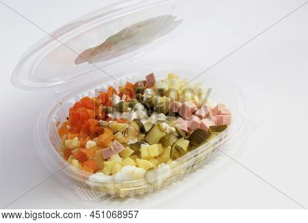 Salad Olivier In A Plastic Container. Lunch In A Disposable Dish.
