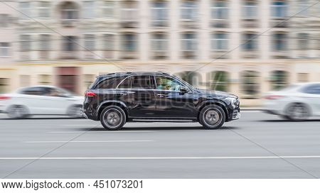 Mercedes Benz Gle Class 300d 2021 Model Is Driving On A City Road. A Car On Street In Motion. Oversp