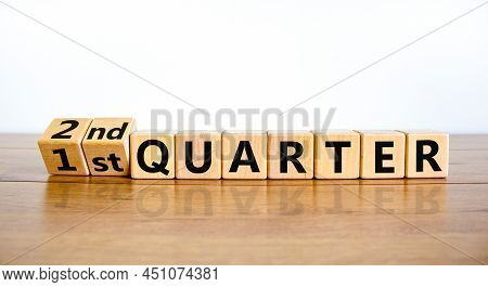 From 1st First To 2nd Second Quarter Symbol. Turned Wooden Cubes And Changed Words 1st Quarter To 2n