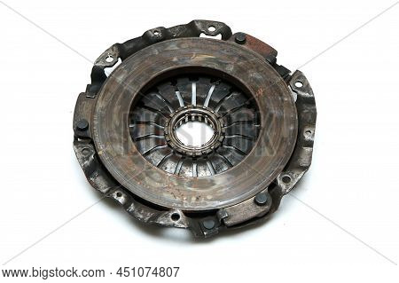 The Old Rusty Used Clutch From The Car Engine Isolated In A White Background. Has To Be Changed For 