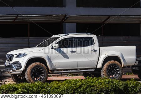 Side; Turkey - March 01 2022:   White Mercedes-benz  X-class   Is Parked  On The Street On A Warm Su