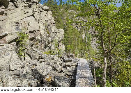 View Of The Pyha-luosto National Park In Summer, Wooden Walkway, Trees And Rocks, Lapland, Finland