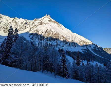 Beautiful Skitour In The Swiss Mountains. Ski Mountaineering. View Of The Mountain Fluebrig And Turn