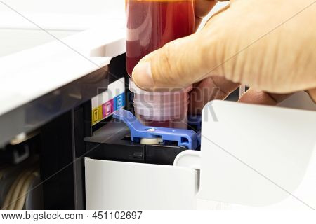 Technicians Are Installing Setup The Ink And Insert Ink Into The Fill Hole. Of An Inkjet Printer, Th