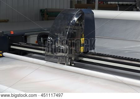Industrial Garment Factory, A Special Laser Cutting Fabric Cuts Out Certain Textile Pieces.