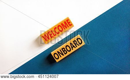 Welcome Onboard Symbol. Concept Words Welcome Onboard On Wooden Blocks On A Beautiful Blue Table Whi