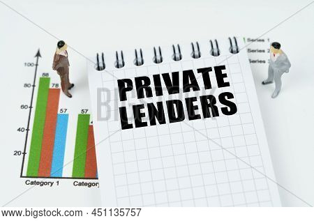 Business And Finance Concept. On The Chart There Are Miniature Figures Of Businessmen And A Notepad 