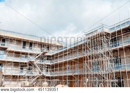 Construction Works In Progress At New Residential Multistorey Appartment Building Made Of Brick And 