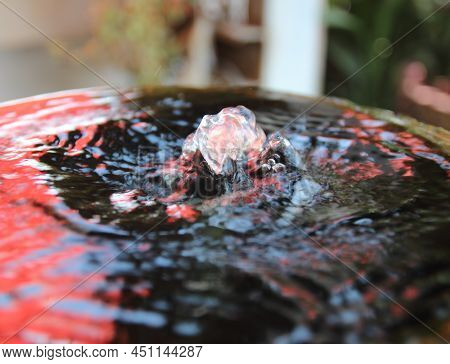 Traditional Water Fountain In The Garden Decoration