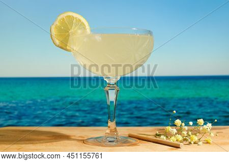 Glass Of Gimlet Cocktail. Beach Bar, Summer Sea Resort Concept.