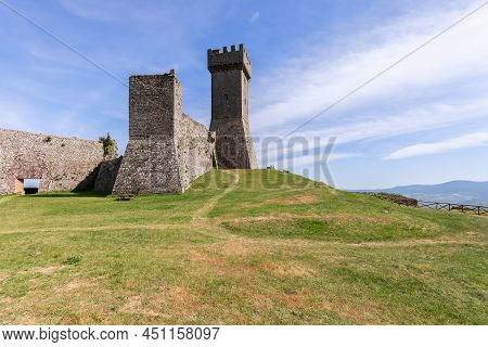 Radicofani - Italy. June 04, 2021: The Rocca Of Radicofani Fortification And Thick Brick Walls Remai