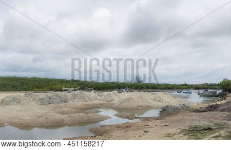 Many Fishing Boats Are Unable To Sail Out Of The Mangrove Forest To Enter The Sea. Because There Was