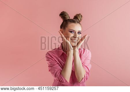 Funny Girls With Pigtails In Pink Shirt On Pink Background. Two Bun Hairstyle. Concept Of Naivety
