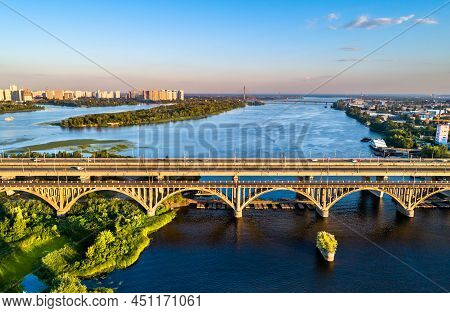 Aerial View Of The Darnytsia Arch Bridges Across The Dnieper In Kiev, Ukraine, Before The Russian In
