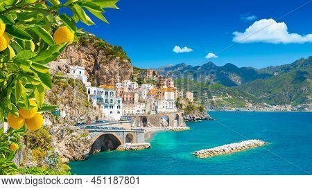 Beautiful View Of Amalfi On The Mediterranean Coast With Lemons In The Foreground, Italy