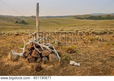 Trail Marker Post With Elk Antlers Marks The Specimen Ridge Trail In Yellowstone National Park