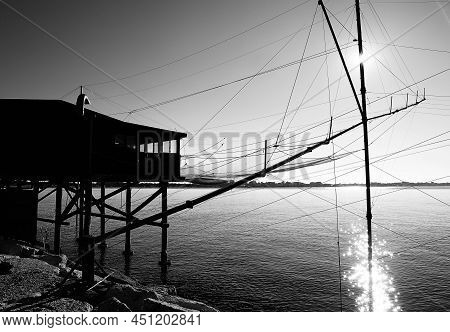 Wooden Fishing Shed With Very Huge Nets On The Sea With Black And White Toned Effect