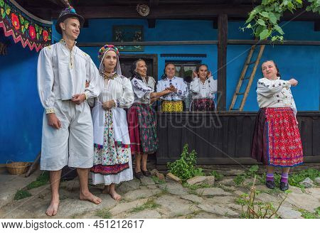 Salaj, Transylvania, Romania- May 14, 2018: Young Couple Dressed In Romanian Folk Costumes Getting M