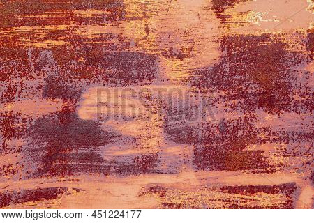 Red Brown Abstract  Background With Pink Hues. A Weathered, Rust-eaten Textured Sheet Of Metal With 