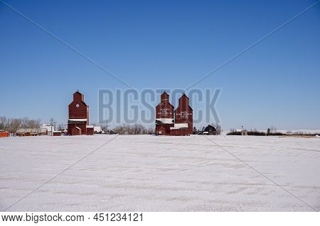 Rowley, Alberta - March 6, 2022: Grain Elevators In The Ghost Town Of Rowley In Winter.