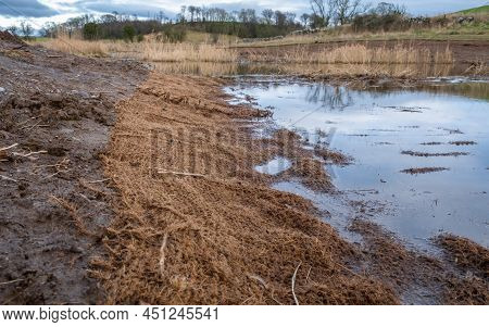 Biodegradable Silt Sediment Net Trap Along A Drainage Channel