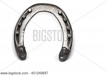 Close Up Of Authentic Used Already Shod Metal Steel Horseshoe With Visible Nail Heads As Decorative 