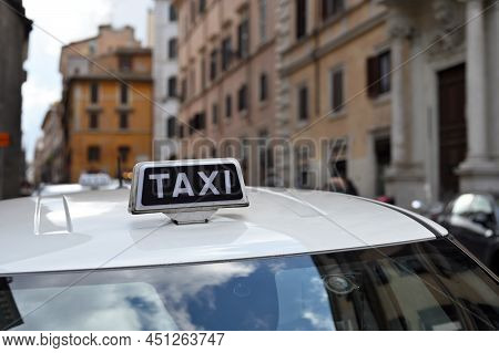 Taxi Cars On The City Street. Rome Taxi Sign, Italy