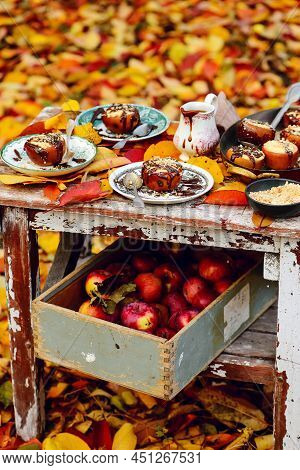 Stuffed Apple Cheesecake On The Table In The Autumn Garden . Selective Focus