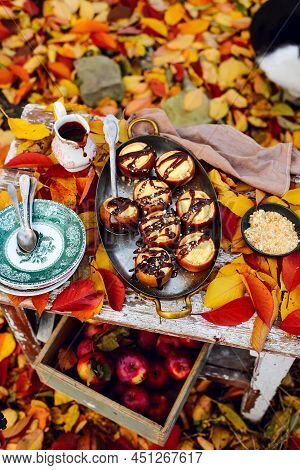 Stuffed Apple Cheesecake On The Table In The Autumn Garden . Selective Focus