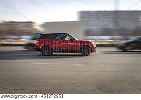 Red Land Rover Range Rover Sport L494 Car In Fast Motion On The City Road. Moscow, Russia - February
