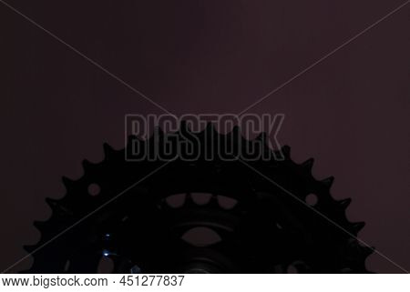 Shine Bicycle Chainring Teeth On Purple Background In Horizontal With Copy Paste