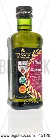 Winneconne, Wi -19 March 2021: A Bottle Of Tassos Extra Virgin Olive Oil On An Isolated Background