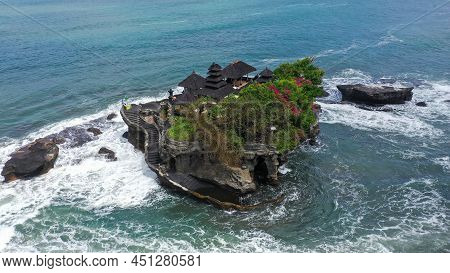 Breathtaking Aerial View Of Of Tanah Lot Temple. Tanah Lot Is A Rock Formation Off The Indonesian Is