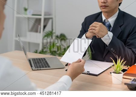 Male Employee Sends A Resignation Letter To An Executive Or Manager. Includes Information About Resi