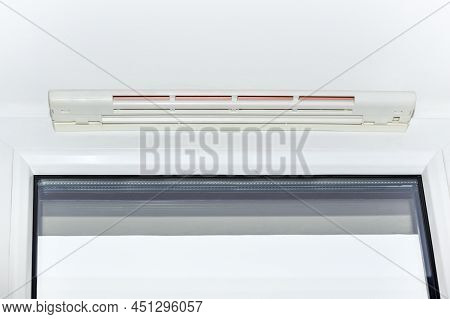Ventilation Valve For Pvc Window. Ventilation System To Supply Air To A Room With Plastic Windows.