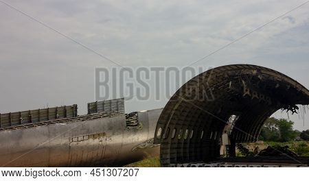 The Wreckage Of The Plane Was Parked On The Open Ground.