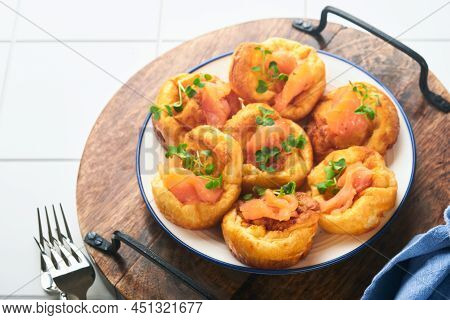 Yorkshire Pudding. Traditional English Yorkshire Pudding With Salmon And Radish Microgreens Side Dis