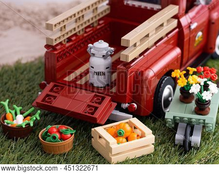 Tambov, Russian Federation - January 02, 2022 A Lego Pickup Truck With Milk Bucket In Its Bed, Some 