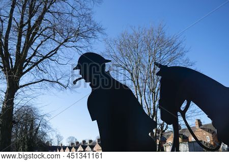 Grantham, England- March 10, 2022. Close Up Of World War 1 Soldier Leading A Horse Silhouettes In Gr