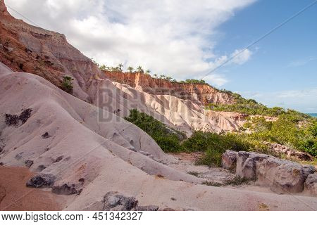 The Red Cliffs Between Trancoso, Taipe Beach And Pitinga Beach In Arraial D\'aujad, Bahia, Brazil