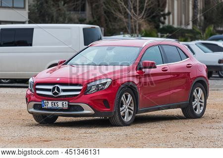 Side; Turkey - March 04 2022:  Red Mercedes-benz Gla   Parked On The Street On A Warm  Day