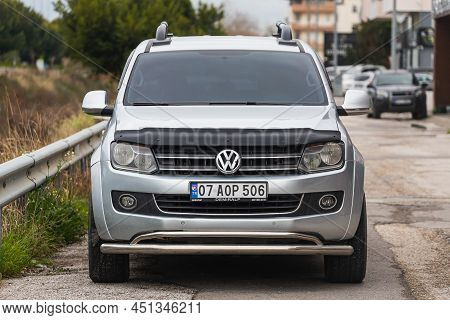 Side; Turkey - March 03 2022:   Silver  Volkswagen Amarok Is Parked  On The Street On A Warm  Day Ag