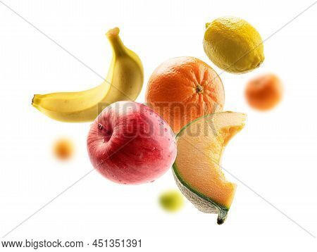 Fresh Fruits Levitate On A White Background
