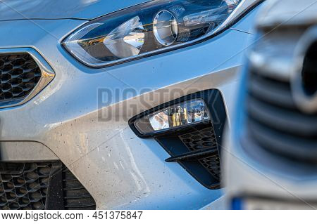 Close-up Of Headlights Of Cars Standing In A Row, Aelective Focus