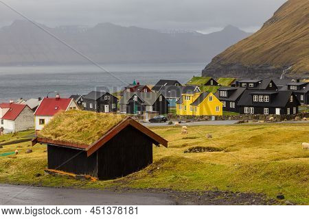 Gjogv, Faroe Islands, Denmark - 05 May 2018: Small Village Gjogv Situated On The Slope Of The Mounta